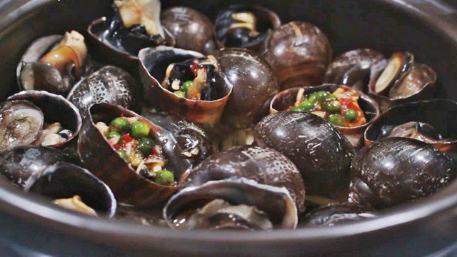 Món ốc hấp tiêu xanh